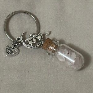 NWOT – Rose quartz chips in a tiny bottle w/keychain & has 2 charms.